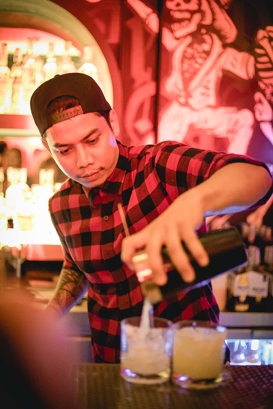 Bartender mixing in Bangkok.